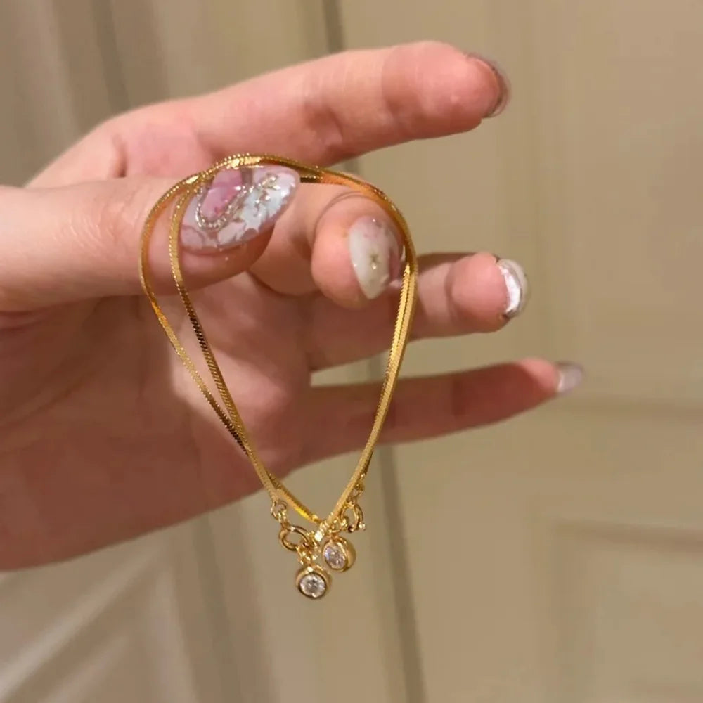 Bracelet Chaîne Lame Cuivre Doré - Zircons Lumineux & Design Minimaliste