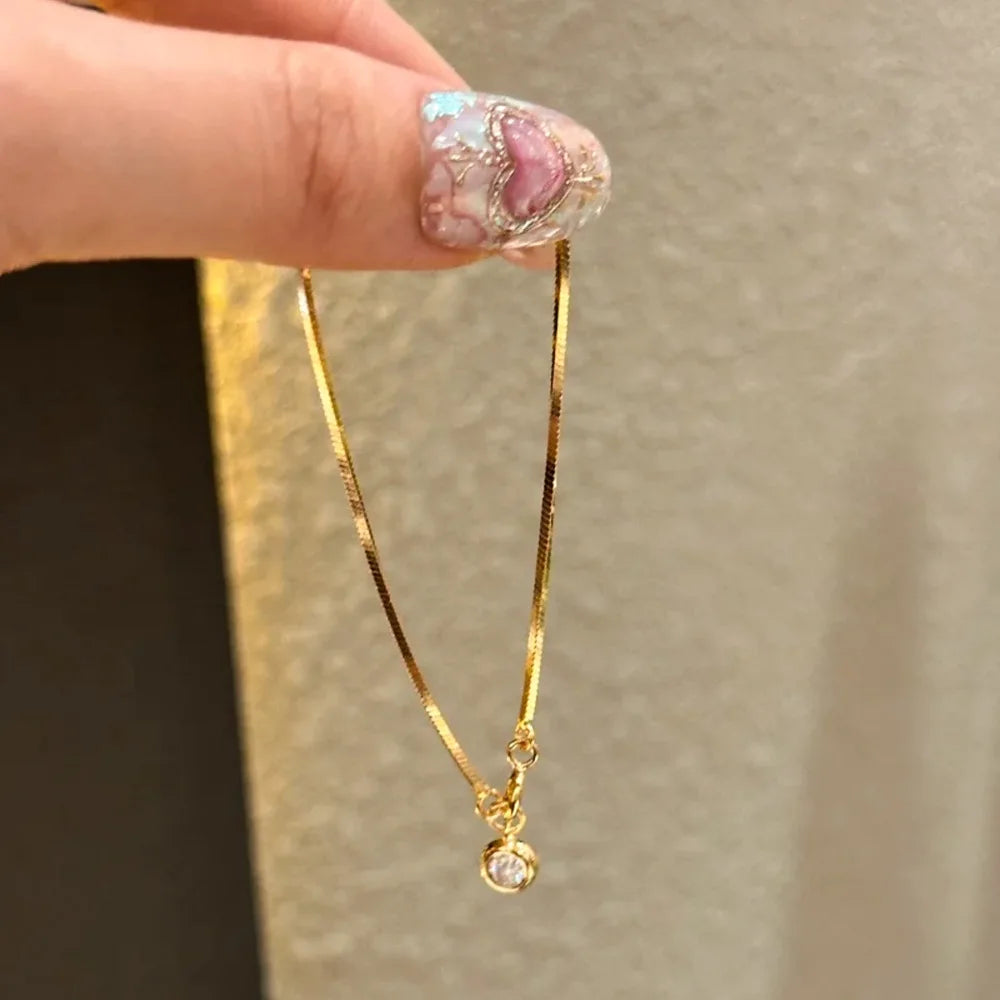 Bracelet Chaîne Lame Cuivre Doré - Zircons Lumineux & Design Minimaliste