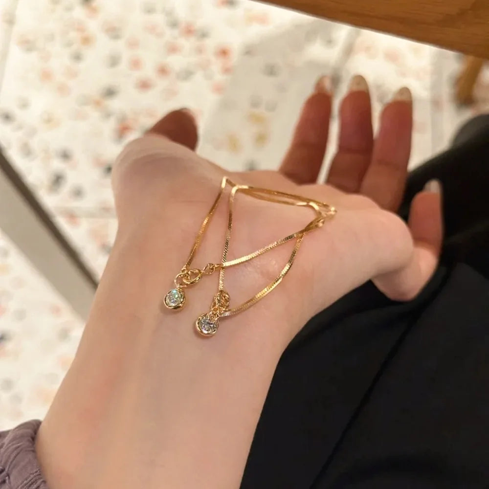 Bracelet Chaîne Lame Cuivre Doré - Zircons Lumineux & Design Minimaliste