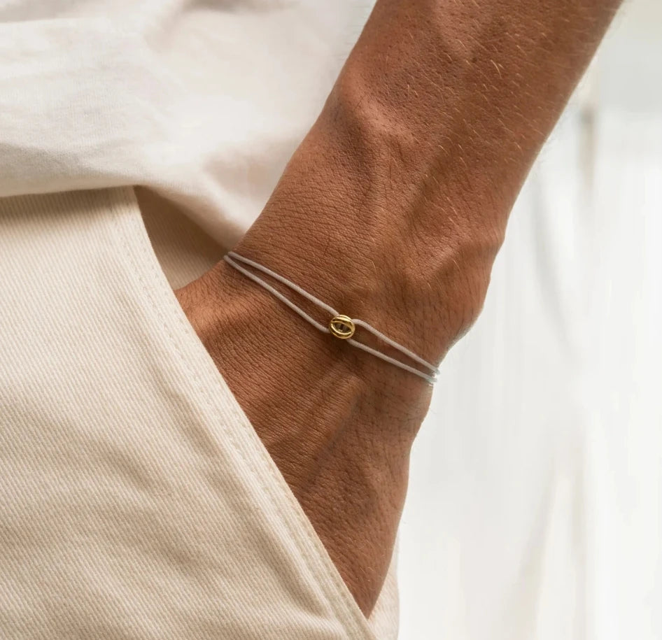 Bracelet Porte-Bonheur Tressé Ajustable - Symbole de Lumière et Protection